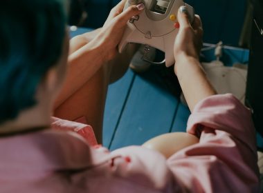 Photo by cottonbro studio: https://www.pexels.com/photo/man-in-pink-shirt-holding-gray-smartphone-4842577/