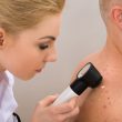doctor identifying the skin issue of their patients dermatologist in New York skin specialist, best dermatologist in new york
