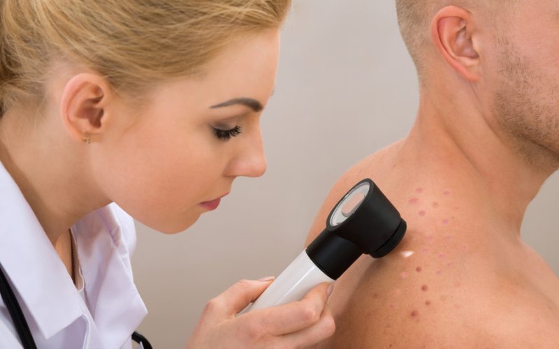 doctor identifying the skin issue of their patients dermatologist in New York skin specialist, best dermatologist in new york