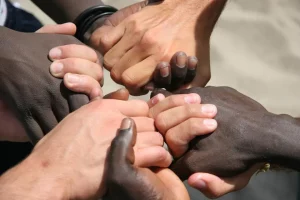 Image by:Unity Between Black And White Community: