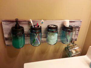 Repurpose Mason Jars for Bathroom Storage