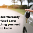 a person holding a key in their handCar Warranty and How Does It Work in Canada?
