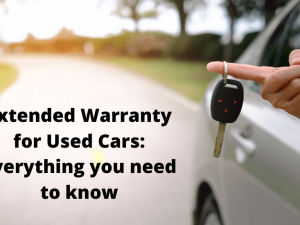 a person holding a key in their handCar Warranty and How Does It Work in Canada?