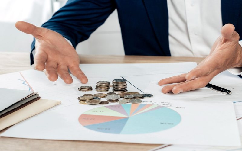 How do business loans help firms cover sudden cash flow gaps